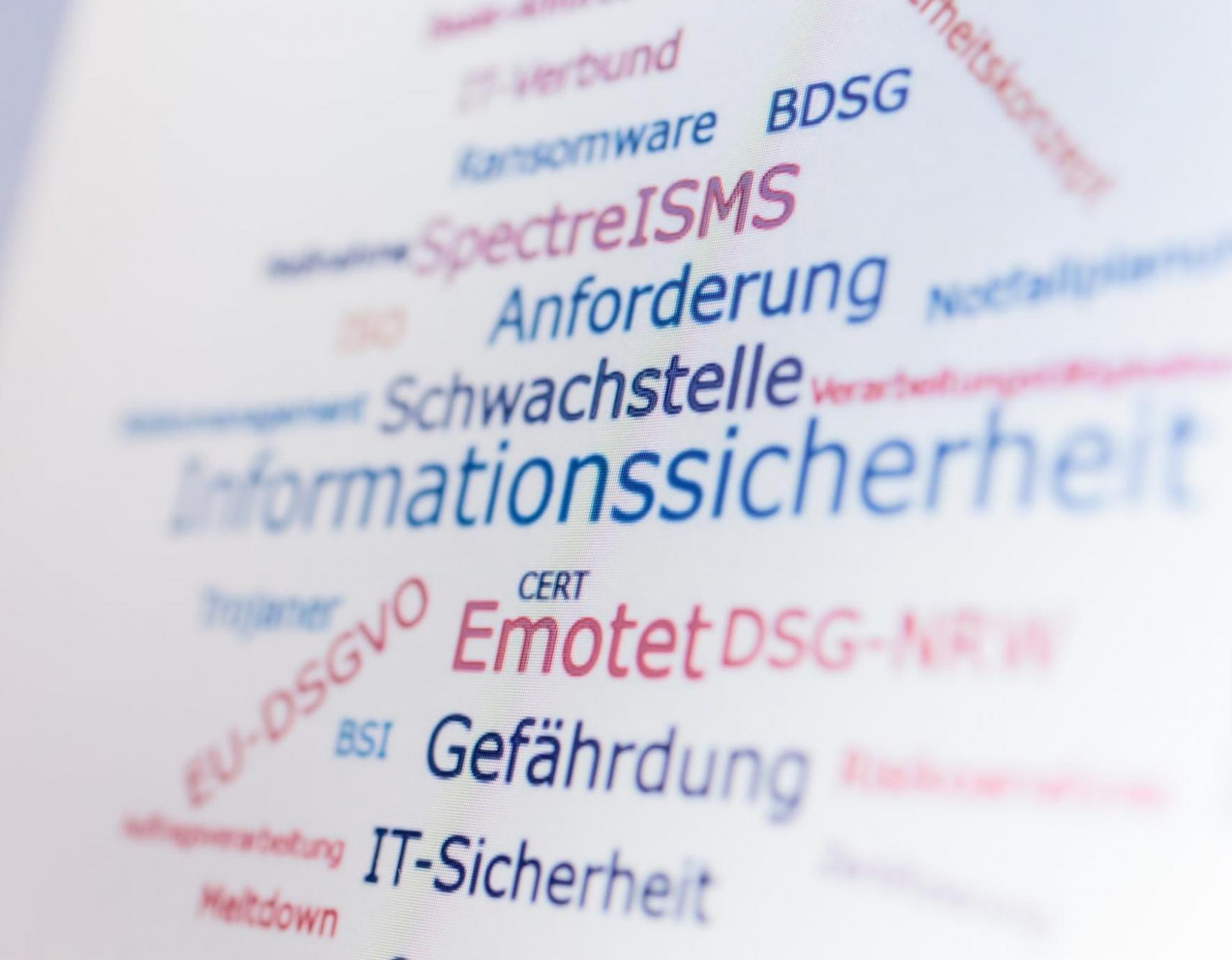 Das Bild zeigt eine Tag-Cloud  mit Wörtern aus dem Arbeitsbereich der Informationssicherheit